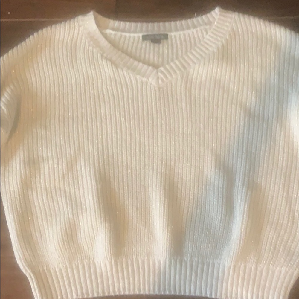 A cropped sweater